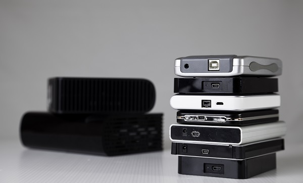 stack of external hard drives